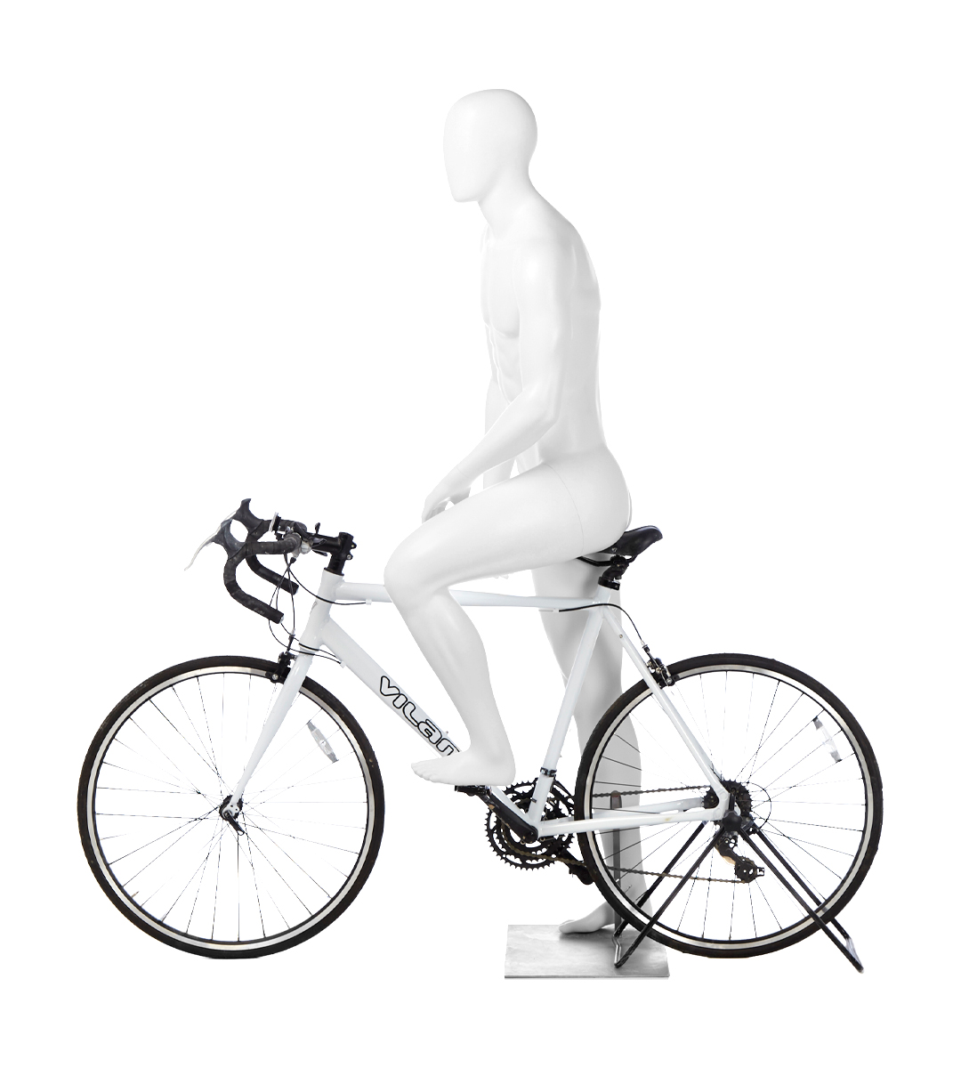 A mannequin with a bike. Fusion Olympus collection.